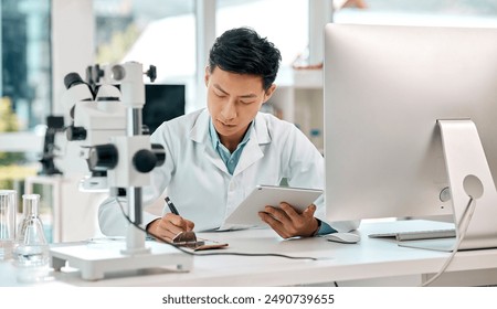 Man, scientist and tablet with notes in lab for medicine research, information and experiment results of studying. Male person, digital and writing checklist, medical analysis and pharmaceutical data - Powered by Shutterstock