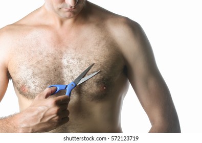 Man With Scissors Cuts Hair On His Hairy Chest