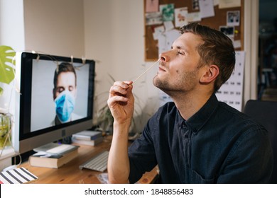 Man self test for COVID-19 home test kit. Coronavirus nasal swab test for infection. Telemedicine and Telehealth distribution of health-related services online. Internet doctor in video call