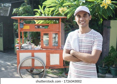 Man Selling Bakso In The Carts. Indonesia Street Food. Small Business Entrepreneur