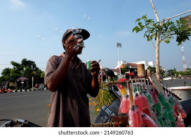 A Man Sells Water Balloon Soap In Jalan Pancasila, Tegal, Central Java, Indonesia, April 14, 2022