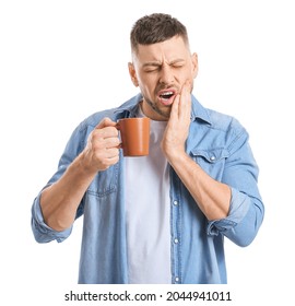 Man With Sensitive Teeth And Hot Coffee On White Background