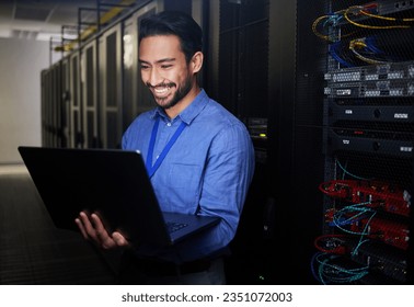 Man, server room and computer for happy programming, system solution and data center, coding or cybersecurity. Business person, laptop and engineering network, gdpr software and backup or maintenance - Powered by Shutterstock