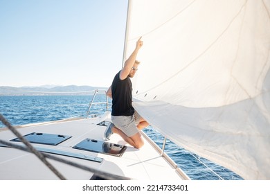 Man Setting Sail On His Boat