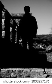the man in the shadows