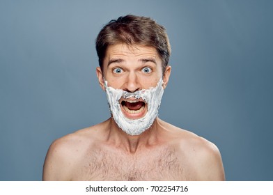 The man in shaving foam screams. - Powered by Shutterstock