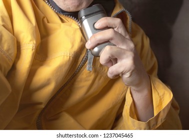 A Man Shaving His Chin With Electric Razor, Studio Close-up