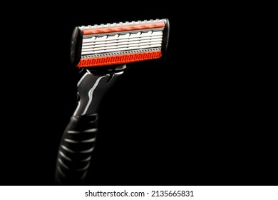 man shaving razor isolated. man shave razor close up