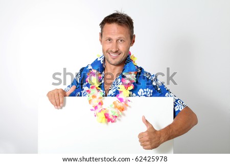 Man with hawa?an shirt on white background