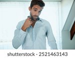 Man, shirt and sweating in home with odor for medical problem, bacteria and hyperhidrosis in bedroom. Professional, person or nervous for smelly underarm, heat and hygiene issue with anxiety in house