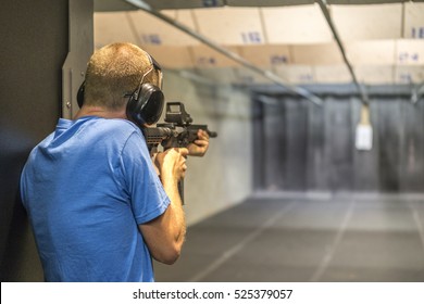 Man Shooting At Firing Range. 