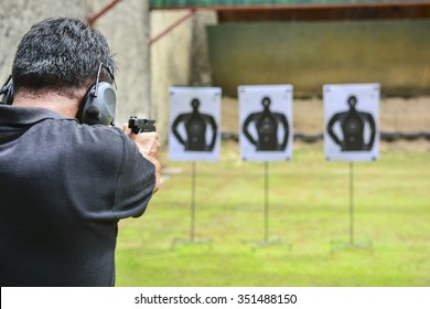 The Man Shooting With Gun