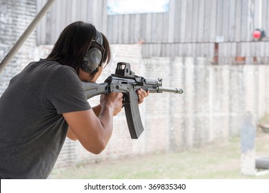 The Man Shooting With Gun