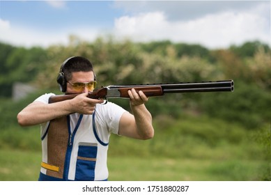 Man Shooting On An Outdoor Shooting Range