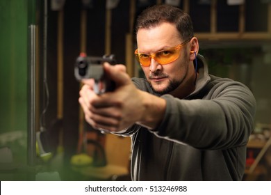 The Man At The Shooting Range.