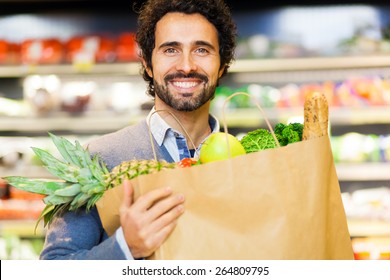 Man Shopping In A Supermarket