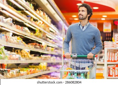 Man Shopping In A Supermarket