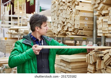 Man Shopping For Timber In DIY Shop