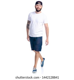 Man In Shorts And Cap Standing Goes Walking Running On White Background Isolation