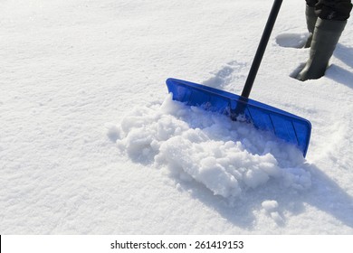 Man Shoveling Snow