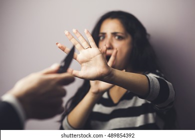 Man Show The Knife And Attack Woman , In Dark Tone