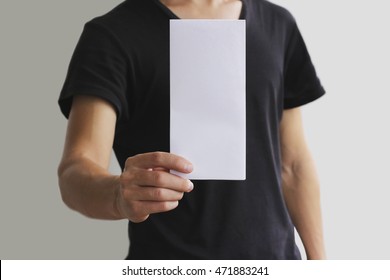 Man Showing Blank White Flyer Brochure Booklet. Leaflet Presentation. Pamphlet Hold Hands. Man Show Clear Offset Paper. Sheet Template. Booklet Design Sheet Display Read First Person