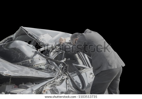 Man showing feeling bad after a car\
accident.Isolate on black\
background