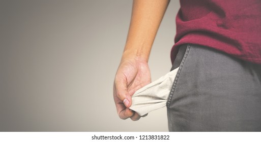 Man Showing Has No Money By Turning Out The Pocket