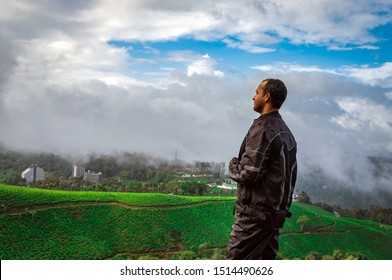 Man Showing His Beautiful Expression Above Tea Garden Image Is Taken At Munnar Kerala India From Low Angle Showing The Completion Of Journey Of Bike Trip And The Beautiful Nature.