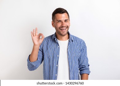 Man Showing Ok Gesture In Studio . - Image