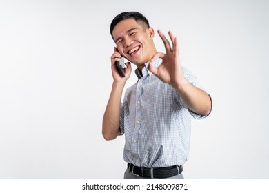 Man Showing Okay Gesture While Making Phone Call