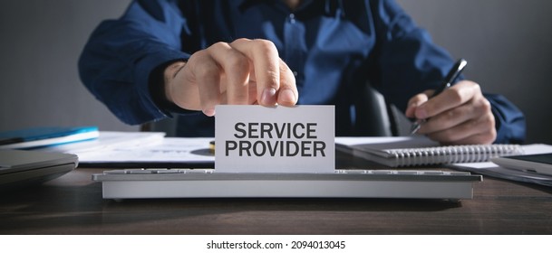 Man Showing Service Provider Text In Business Card.