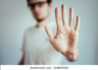 Man Showing Stop Gesture, Close Up Of The Hand