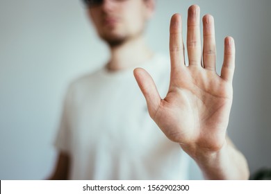 Man Showing Stop Gesture, Close Up Of The Hand