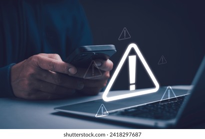 Man showing warning of access to software, virus, dangerous cyber attack or internet threat, technology security with virtual graphics, concept, of warning or alert and technology scam.