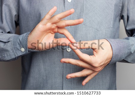Man showing word interpreter, closeup view. American sign language