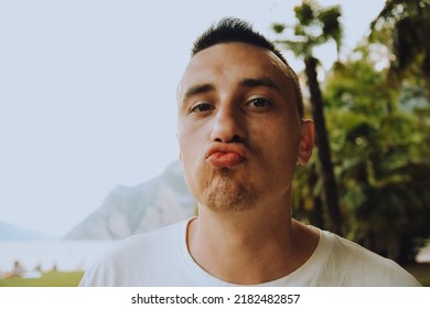 A Man Shows An Air Kiss To The Camera. Gentle And Kind Man, Romantic. Man Kissing The Camera