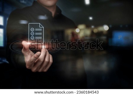 A man shows a list of planned to-do icons on a dark background.