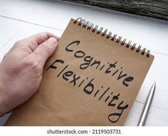 Man Shows Page With Words Cognitive Flexibility.