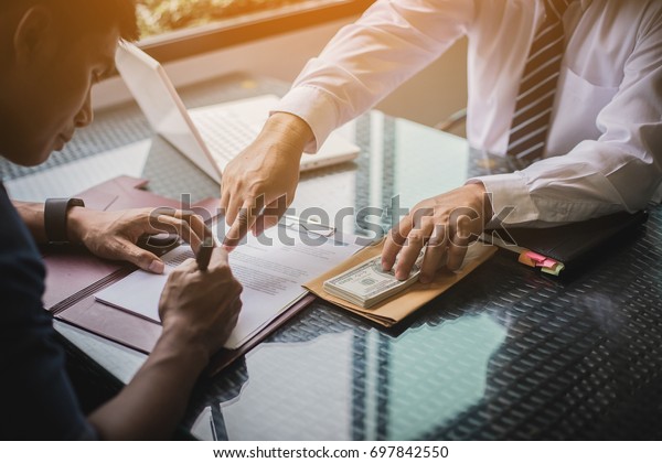 the man sign contract to borrow money from
investor to invest at own
business