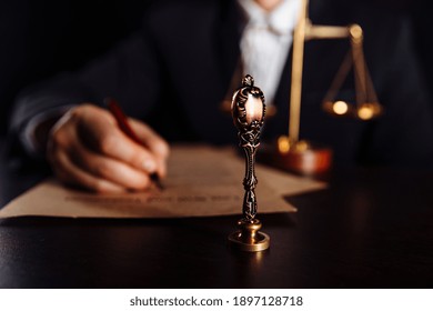 Man Signing A Last Will And Testament Document In Notary Public Office. Law Concept