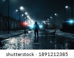 Man silhouette in misty alley at night city park, mystery and horror foggy cityscape atmosphere, alone stalker or crime person