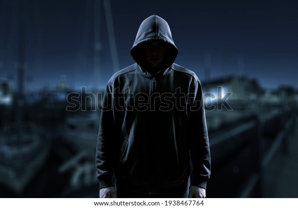Man silhouette in the misty alley at night city,\
alone stalker or crime\
person