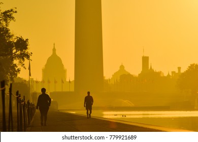 A man silhouette in a misty sunrise at National Mall - Washington DC USA - Powered by Shutterstock