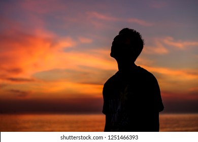 Man Silhouette On Beautiful Sunset