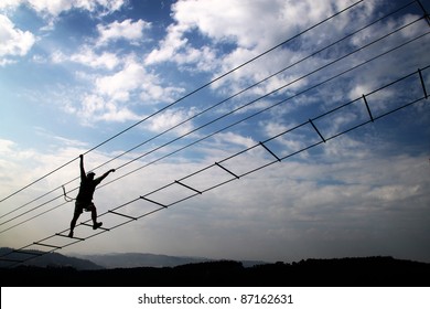 Man silhouette on radical bridge - Powered by Shutterstock