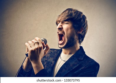 Man Singing With Microphone