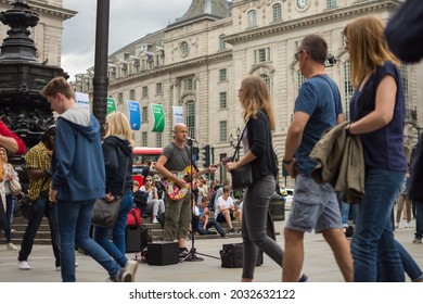 A Man Singing In Picadilly Circus, London, August 2017