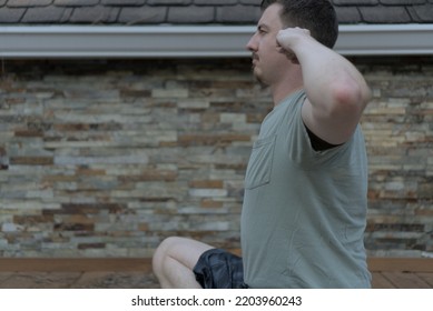 Man Siting In Half-lotus Practicing Bhramari, Humming Bee Breathing, Pranayama