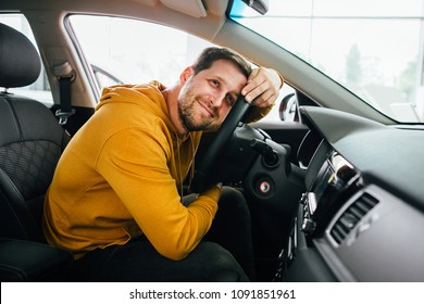 Man Sits In His Lovely Car.